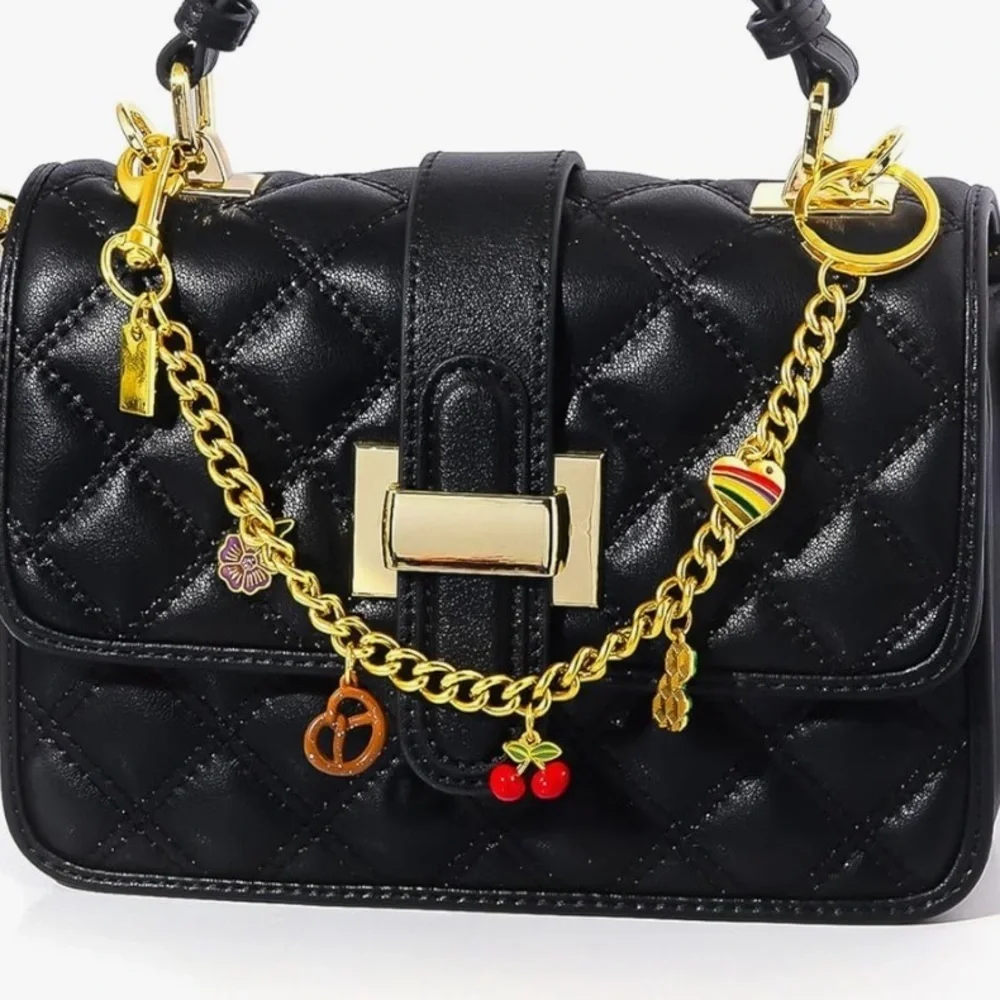 Purse bag charm in gold links with cherry pretzel flower Dino clips on bag